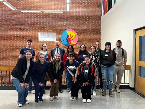 Group photo with first-gen students and President Dean